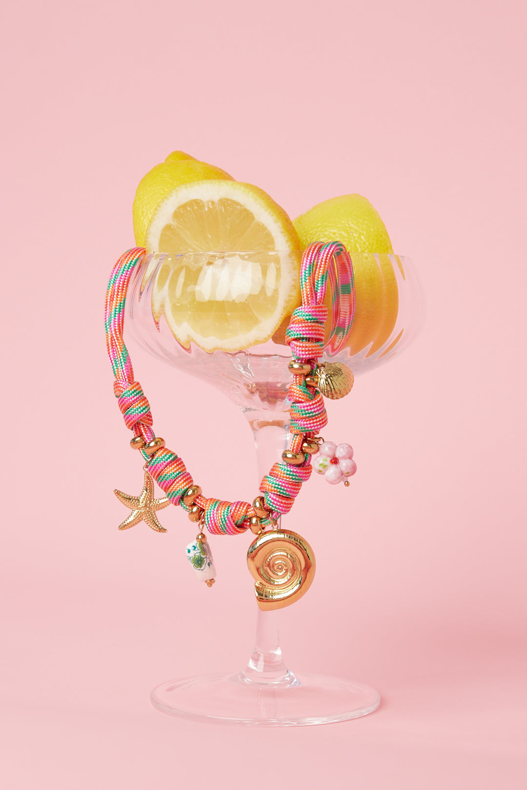 Rope chain with knots and shell charms