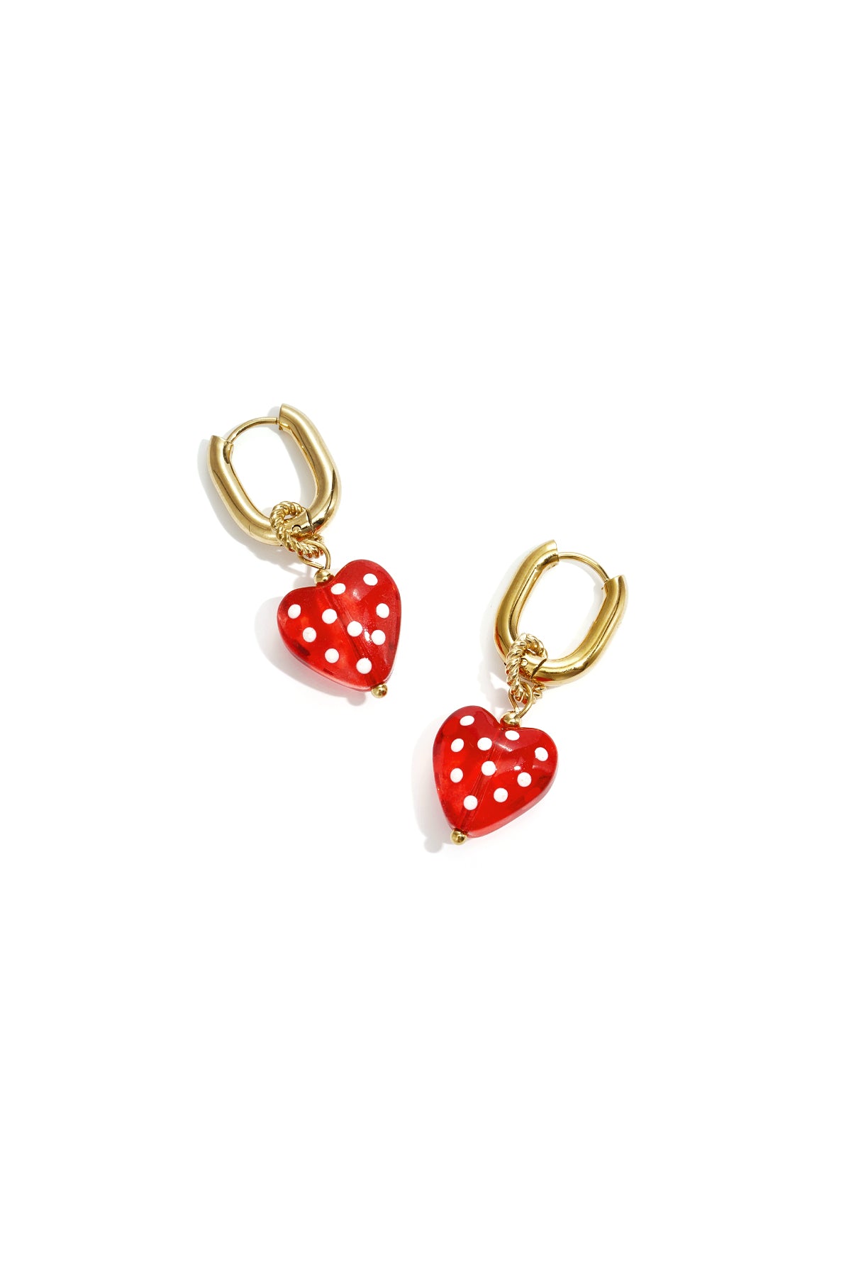 Earrings with dangling hearts with dots